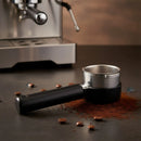 Portafiltro con cafetera Saeco